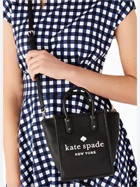 Kate Spade ELLA Mini Black Tote with Cream Logo and silver hardware.